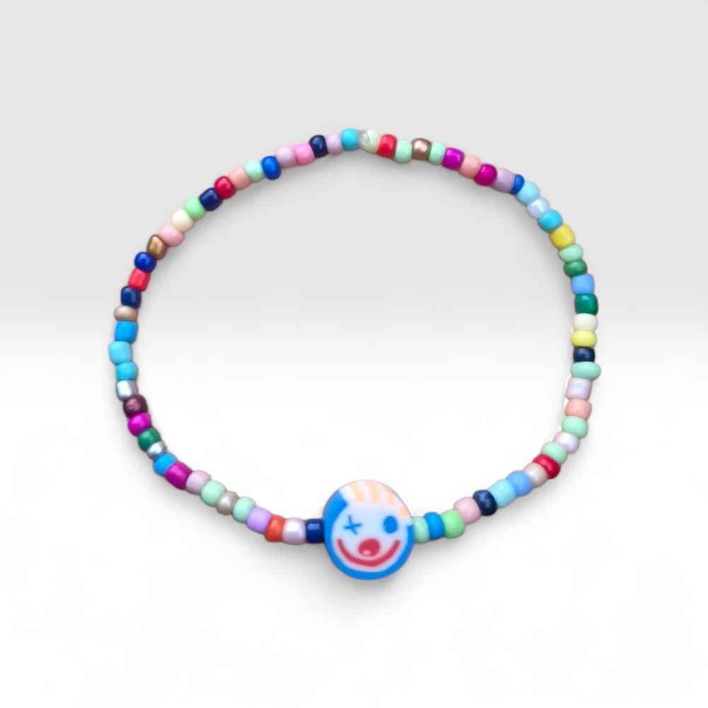 Colorful Beaded Bracelet with Smiley Charm